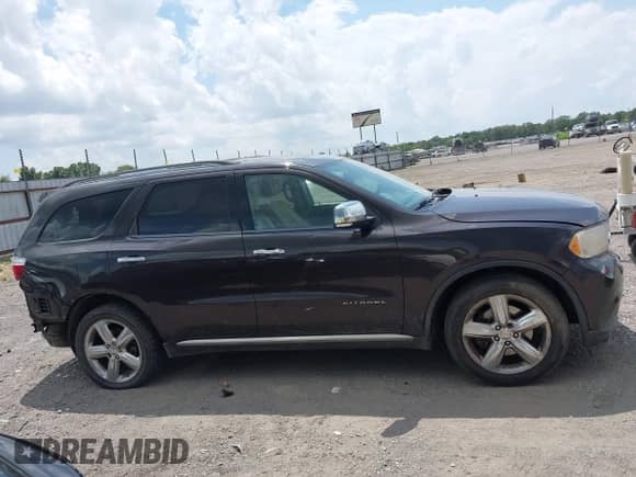 2013 Dodge Durango Citadel with VIN 1C4RDHEG3DC562477, listed as a IAAI auction lot 42645709 with 207,383 mi miles and . Bid and sale history available at DreamBid. Image 14.