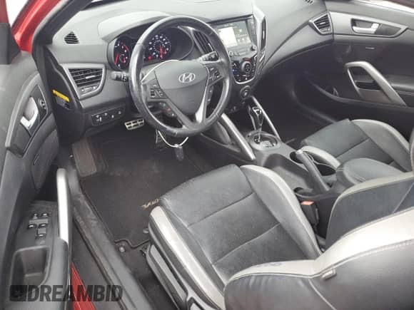 2017 Hyundai Veloster Turbo с VIN KMHTC6AE1HU308537, выставлен на аукционе Copart как лот 82091385 с пробегом 75 199 миль миль и Списание • Salvage title. История ставок и продаж доступна на DreamBid. Изображение 8.
