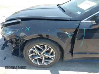 2023 Hyundai Sonata SEL z VIN KMHL14JA5PA272567, wystawiony jako IAAI lot #43205474 z przebiegiem 26 815 mil mil oraz . Historia ofert i sprzedaży dostępna na DreamBid. Obrazek 6.