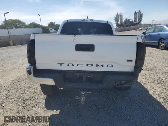 2020 Toyota Tacoma SR5 с VIN 3TMAZ5CN0LM120428, выставлен на аукционе Copart как лот 69748535 с пробегом 147 306 миль миль и Списание • Salvage title. История ставок и продаж доступна на DreamBid. Изображение 6.