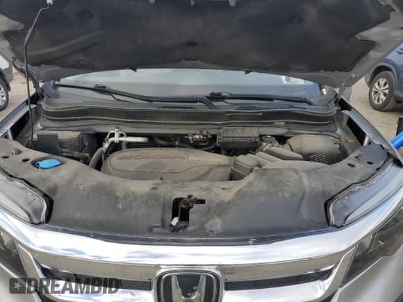 2019 Honda Pilot EX-L z VIN 5FNYF6H44KB042588, wystawiony jako Copart lot #90079785 z przebiegiem 53 921 mil mil oraz Szkoda całkowita • Salvage title. Historia ofert i sprzedaży dostępna na DreamBid. Obrazek 12.