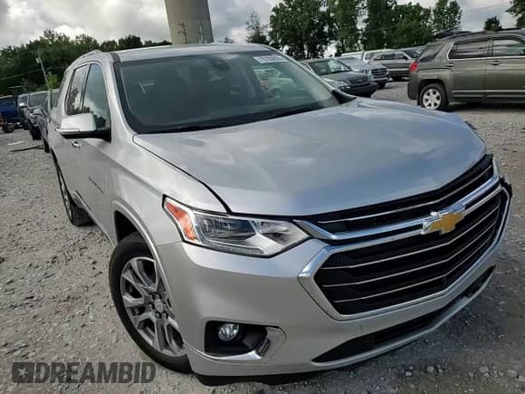 2020 Chevrolet Traverse Premier с VIN 1GNEVKKW5LJ156500, выставлен на аукционе Copart как лот 70183035 с пробегом 53 594 миль миль и Списание • Salvage title. История ставок и продаж доступна на DreamBid. Изображение 14.