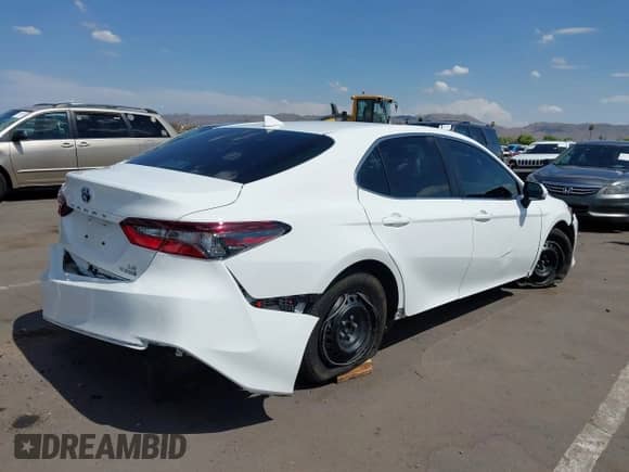 2022 Toyota Camry Hybrid LE with VIN 4T1C31AK8NU594181, listed as a IAAI auction lot 42666278 with 35,921 mi miles and . Bid and sale history available at DreamBid. Image 4.