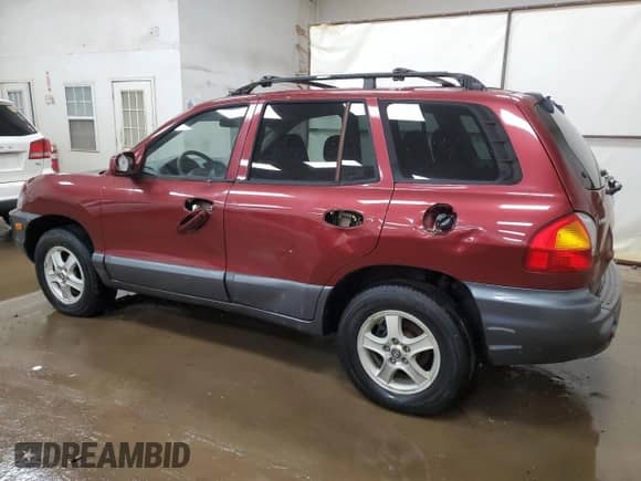 2004 Hyundai Santa Fe z VIN KM8SB12B44U646059, wystawiony jako Copart lot #64770184 z przebiegiem 160 936 mil mil oraz Czysty tytuł • Clean title. Historia ofert i sprzedaży dostępna na DreamBid. Obrazek 2.