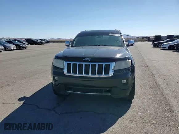 2012 Jeep Grand Cherokee Limited z VIN 1C4RJFBT5CC210966, wystawiony jako Copart lot #71712565 z przebiegiem 139 539 mil mil oraz Szkoda całkowita • Salvage title. Historia ofert i sprzedaży dostępna na DreamBid. Obrazek 15.