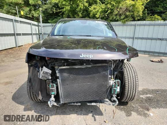 2017 Jeep Grand Cherokee Overland with VIN 1C4RJECG1HC659385, listed as a Copart auction lot 82172205 with 67,873 mi miles and Salvage title. Bid and sale history available at DreamBid. Image 5.