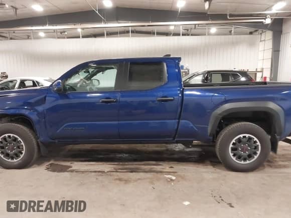 2024 Toyota Tacoma SR5 with VIN 3TMLB5JN3RM054207, listed as a IAAI auction lot 41171946 with 3,808 mi miles and . Bid and sale history available at DreamBid. Image 14.