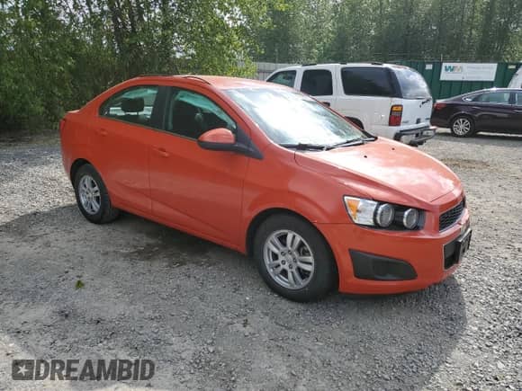 2012 Chevrolet Sonic LT z VIN 1G1JD5SB3C4231033, wystawiony jako Copart lot #56145205 z przebiegiem 43 015 mil mil oraz Szkoda całkowita • Salvage title. Historia ofert i sprzedaży dostępna na DreamBid. Obrazek 4.