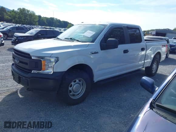 2019 Ford F-150 XL with VIN 1FTFW1E50KFB94211, listed as a IAAI auction lot 42996836 with 149,163 mi miles and . Bid and sale history available at DreamBid. Image 23.