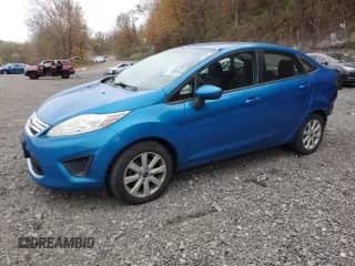 2012 Ford Fiesta SE with VIN 3FADP4BJ6CM155573, listed as a Copart auction lot 89729035 with 93,216 mi miles and Salvage title. Bid and sale history available at DreamBid. Image 1.