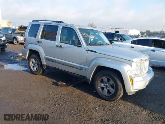 2011 Jeep Liberty Sport with VIN 1J4PN2GKXBW516850, listed as a IAAI auction lot 43520931 with 111,079 mi miles and . Bid and sale history available at DreamBid. Image 1.
