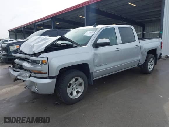 2017 Chevrolet Silverado 1500 LT with VIN 3GCUKREC0HG456350, listed as a IAAI auction lot 43325671 with 152,647 mi miles and . Bid and sale history available at DreamBid. Image 19.