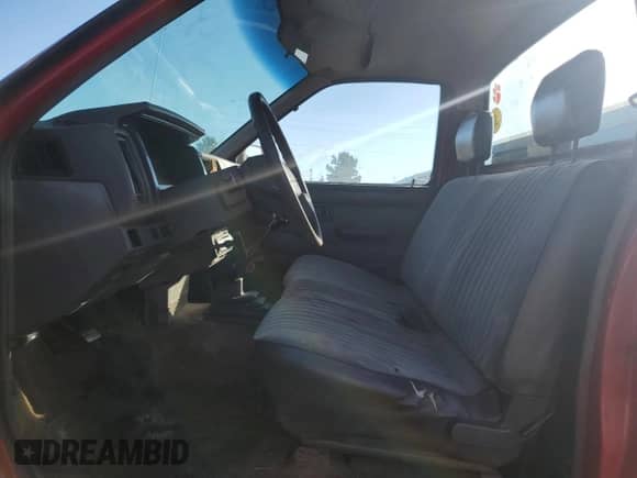 1990 Nissan Frontier z VIN 1N6SD11SXLC348469, wystawiony jako Copart lot #43247865 z przebiegiem 242 347 mil mil oraz Szkoda całkowita • Salvage title. Historia ofert i sprzedaży dostępna na DreamBid. Obrazek 7.