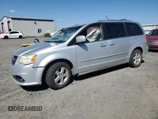 2011 Dodge Grand Caravan Crew with VIN 2D4RN5DGXBR752491, listed as a Copart auction lot 65971955 with 130,011 mi miles and Salvage title. Bid and sale history available at DreamBid. Image 1.