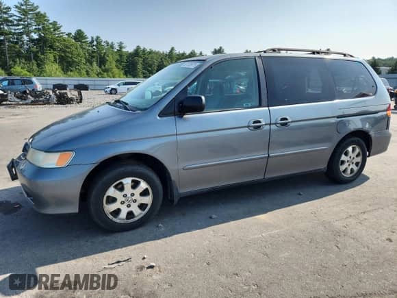 2002 Honda Odyssey LX with VIN 2HKRL18532H504584, listed as a Copart auction lot 67735975 with 230,708 mi miles and Salvage title. Bid and sale history available at DreamBid. Image 1.