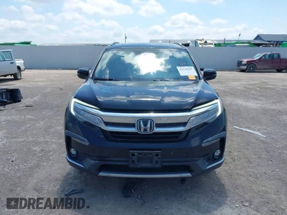2020 Honda Pilot Elite with VIN 5FNYF6H0XLB032663, listed as a IAAI auction lot 42336547 with 102,386 mi miles and . Bid and sale history available at DreamBid. Image 12.