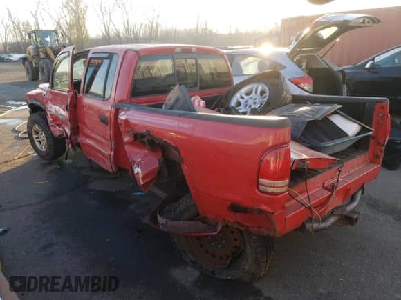 2002 Dodge Dakota Sport с VIN 1B7HG38NX2S515384, выставлен на аукционе Copart как лот 80640954 с пробегом 247 495 миль миль и Списание • Salvage title. История ставок и продаж доступна на DreamBid. Изображение 2.