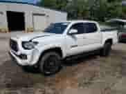 2022 Toyota Tacoma SR5 with VIN 3TMAZ5CN3NM184188, listed as a Copart auction lot 80107995 with 67,428 mi miles and Salvage title. Bid and sale history available at DreamBid. Image 1.