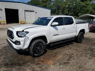 2022 Toyota Tacoma SR5 with VIN 3TMAZ5CN3NM184188, listed as a Copart auction lot 80107995 with 67,428 mi miles and Salvage title. Bid and sale history available at DreamBid. Image 1.