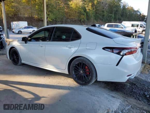 2023 Toyota Camry XSE with VIN 4T1K61AK3PU752318, listed as a Copart auction lot 82528645 with 58,635 mi miles and Salvage title. Bid and sale history available at DreamBid. Image 2.