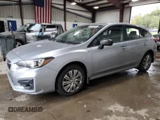 2017 Subaru Impreza with VIN 4S3GTAA67H3718234, listed as a Copart auction lot 82391655 with 160,000 mi miles and Salvage title. Bid and sale history available at DreamBid. Image 1.