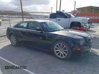 2007 Chrysler 300 C SRT-8 with VIN 2C3LA73W37H658358, listed as a IAAI auction lot 43439006 with 175,088 mi miles and . Bid and sale history available at DreamBid. Image 1.