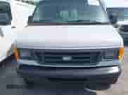 2006 Ford Econoline Cargo with VIN 1FTNE24W66HB44860, listed as a IAAI auction lot 43204241 with 222,380 mi miles and . Bid and sale history available at DreamBid. Image 6.