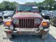 2004 Jeep Wrangler Sahara с VIN 1J4FA59S94P717464, выставлен на аукционе Copart как лот 66406845 с пробегом 171 731 миль миль и Чистый • Clean title. История ставок и продаж доступна на DreamBid. Изображение 5.