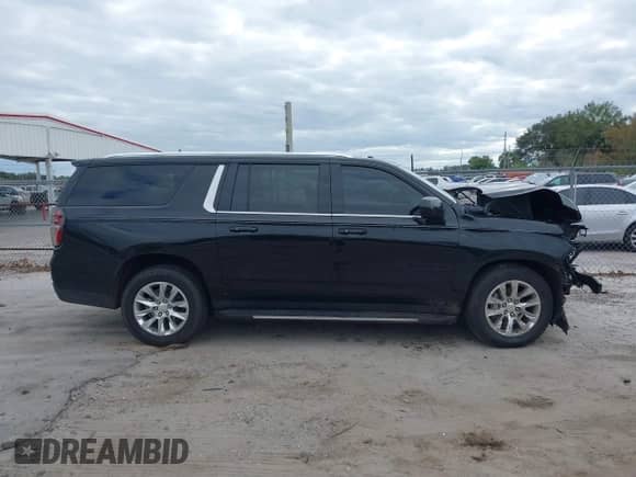 2023 Chevrolet Suburban LS z VIN 1GNSCBKD1PR283727, wystawiony jako IAAI lot #40763141 z przebiegiem 65 218 mil mil oraz . Historia ofert i sprzedaży dostępna na DreamBid. Obrazek 14.