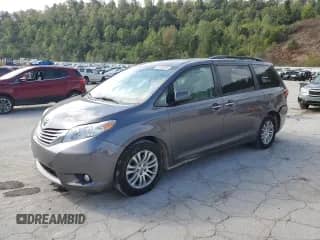 2015 Toyota Sienna XLE with VIN 5TDYK3DC7FS567248, listed as a Copart auction lot 80903245 with 143,175 mi miles and Salvage title. Bid and sale history available at DreamBid. Image 1.