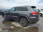 2017 Jeep Grand Cherokee Overland with VIN 1C4RJECG5HC605538, listed as a Copart auction lot 81946415 with 100,658 mi miles and Salvage title. Bid and sale history available at DreamBid. Image 2.