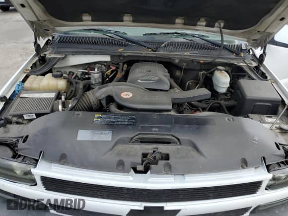 2004 Chevrolet Tahoe LS z VIN 1GNEC13V34R257463, wystawiony jako Copart lot #82425565 z przebiegiem 134 554 mil mil oraz Szkoda całkowita • Salvage title. Historia ofert i sprzedaży dostępna na DreamBid. Obrazek 12.