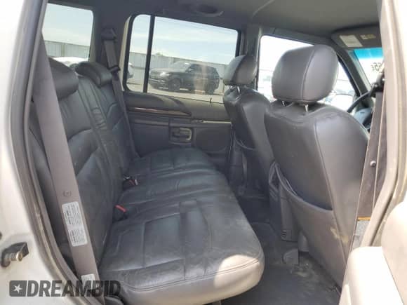 1999 Ford Explorer XLT with VIN 1FMZU34E1XZA28197, listed as a Copart auction lot 58852855 with 115,367 mi miles and Salvage title. Bid and sale history available at DreamBid. Image 11.