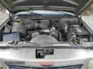 2000 Cadillac Escalade z VIN 1GYEK13RXYR103671, wystawiony jako Copart lot #48146125 z przebiegiem 271 195 mil mil oraz Szkoda całkowita • Salvage title. Historia ofert i sprzedaży dostępna na DreamBid. Obrazek 12.