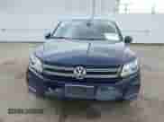 2013 Volkswagen Tiguan SE z VIN WVGAV3AX9DW613283, wystawiony jako IAAI lot #41954359 z przebiegiem 147 525 mil mil oraz . Historia ofert i sprzedaży dostępna na DreamBid. Obrazek 12.