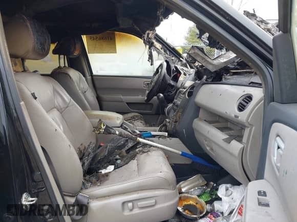 2014 Honda Pilot EX-L with VIN 5FNYF4H71EB007543, listed as a IAAI auction lot 41686545 with 147,082 mi miles and . Bid and sale history available at DreamBid. Image 5.