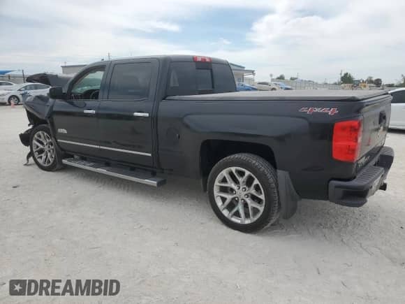 2014 Chevrolet Silverado 1500 High Country with VIN 3GCUKTEJ5EG319671, listed as a Copart auction lot 50453775 with Not provided miles and Salvage title. Bid and sale history available at DreamBid. Image 2.