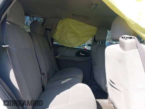 2007 Chevrolet TrailBlazer LT z VIN 1GNDS13S672196434, wystawiony jako IAAI lot #41841452 z przebiegiem 144 514 mil mil oraz . Historia ofert i sprzedaży dostępna na DreamBid. Obrazek 8.