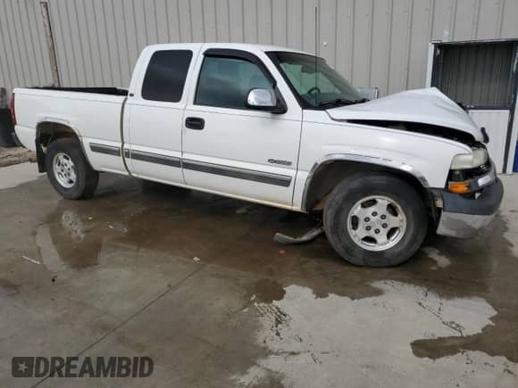 2000 Chevrolet Silverado 1500 LS z VIN 1GCEC19T1YZ371644, wystawiony jako Copart lot #69552395 z przebiegiem Nie podano mil oraz Szkoda całkowita • Salvage title. Historia ofert i sprzedaży dostępna na DreamBid. Obrazek 4.