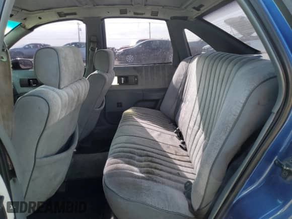 1991 Chevrolet Caprice z VIN 1G1BL53E9MW205686, wystawiony jako Copart lot #42391065 z przebiegiem 169 346 mil mil oraz Szkoda całkowita • Salvage title. Historia ofert i sprzedaży dostępna na DreamBid. Obrazek 10.