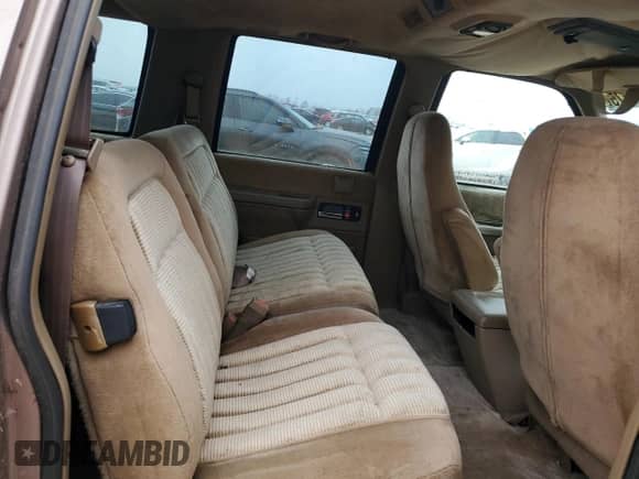 1994 Chevrolet Suburban with VIN 1GNEC16K9RJ358692, listed as a Copart auction lot 43223375 with 255,948 mi miles and Salvage title. Bid and sale history available at DreamBid. Image 12.