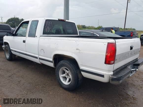 1997 Chevrolet Silverado 1500 with VIN 2GCEC19R9V1198951, listed as a IAAI auction lot 43413451 with 215,096 mi miles and . Bid and sale history available at DreamBid. Image 3.