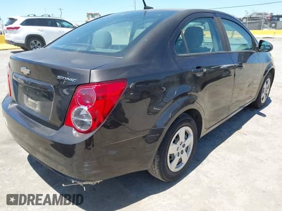 2014 Chevrolet Sonic LS with VIN 1G1JA5SGXE4136167, listed as a IAAI auction lot 42678771 with 120,024 mi miles and . Bid and sale history available at DreamBid. Image 6.