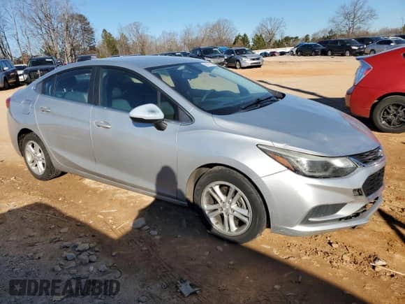 2017 Chevrolet Cruze LT with VIN 1G1BE5SMXH7102487, listed as a Copart auction lot 89161165 with 166,533 mi miles and Salvage title. Bid and sale history available at DreamBid. Image 4.