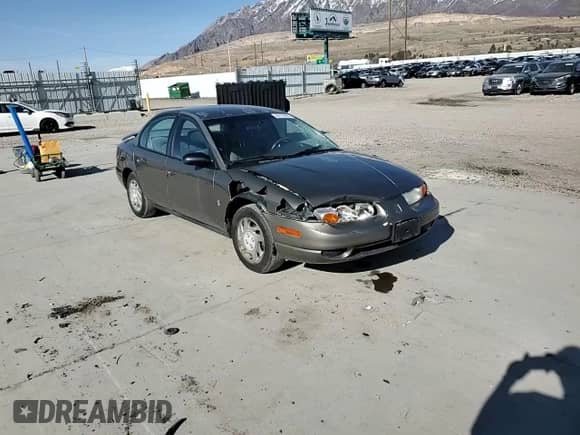 2000 Saturn SL with VIN 1G8ZK5276YZ227493, listed as a Copart auction lot 48172835 with 105,806 mi miles and Salvage title. Bid and sale history available at DreamBid. Image 10.