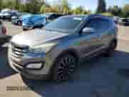 2014 Hyundai Santa Fe с VIN 5XYZUDLB1EG166626, выставлен на аукционе Copart как лот 82498295 с пробегом 210 092 миль миль и Чистый • Clean title. История ставок и продаж доступна на DreamBid. Изображение 1.