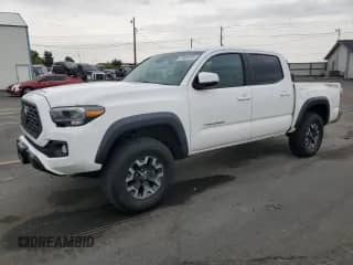 2020 Toyota Tacoma SR5 z VIN 3TMCZ5AN3LM304841, wystawiony jako Copart lot #70488165 z przebiegiem 51 023 mil mil oraz Szkoda całkowita • Salvage title. Historia ofert i sprzedaży dostępna na DreamBid. Obrazek 1.
