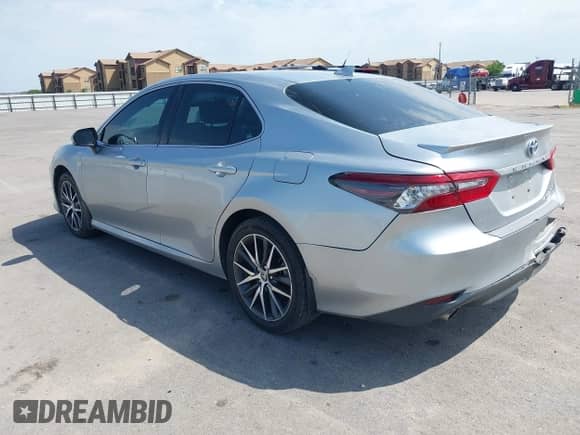 2021 Toyota Camry Hybrid XLE with VIN 4T1F31AK5MU565376, listed as a IAAI auction lot 42687616 with 57,880 mi miles and . Bid and sale history available at DreamBid. Image 3.