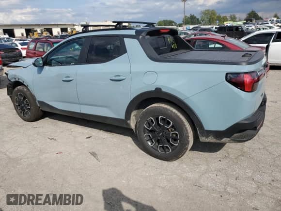 2022 Hyundai Santa Cruz SEL Premium с VIN 5NTJDDAF9NH022366, выставлен на аукционе Copart как лот 73523854 с пробегом 27 021 миль миль и Списание • Salvage title. История ставок и продаж доступна на DreamBid. Изображение 2.