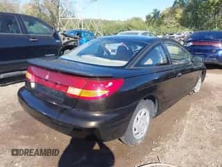 1997 Saturn SC with VIN 1G8ZE1283VZ163658, listed as a IAAI auction lot 40494467 with 111,701 mi miles and . Bid and sale history available at DreamBid. Image 4.